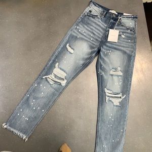 NWT Kancan jeans. Size 24, distressed straight leg fit. Never worn.